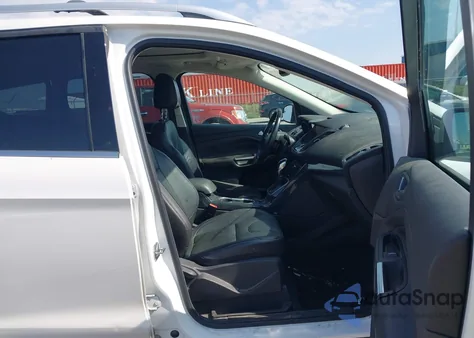 2013 Ford Escape Titanium z USA, uszkodzony, nr VIN 1FMCU9J94DUA34052